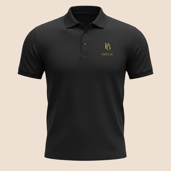 PUNJAB BOLDA ANAKH premium black pique cotton polo shirt with gold logo embroidery and 3-button placket.