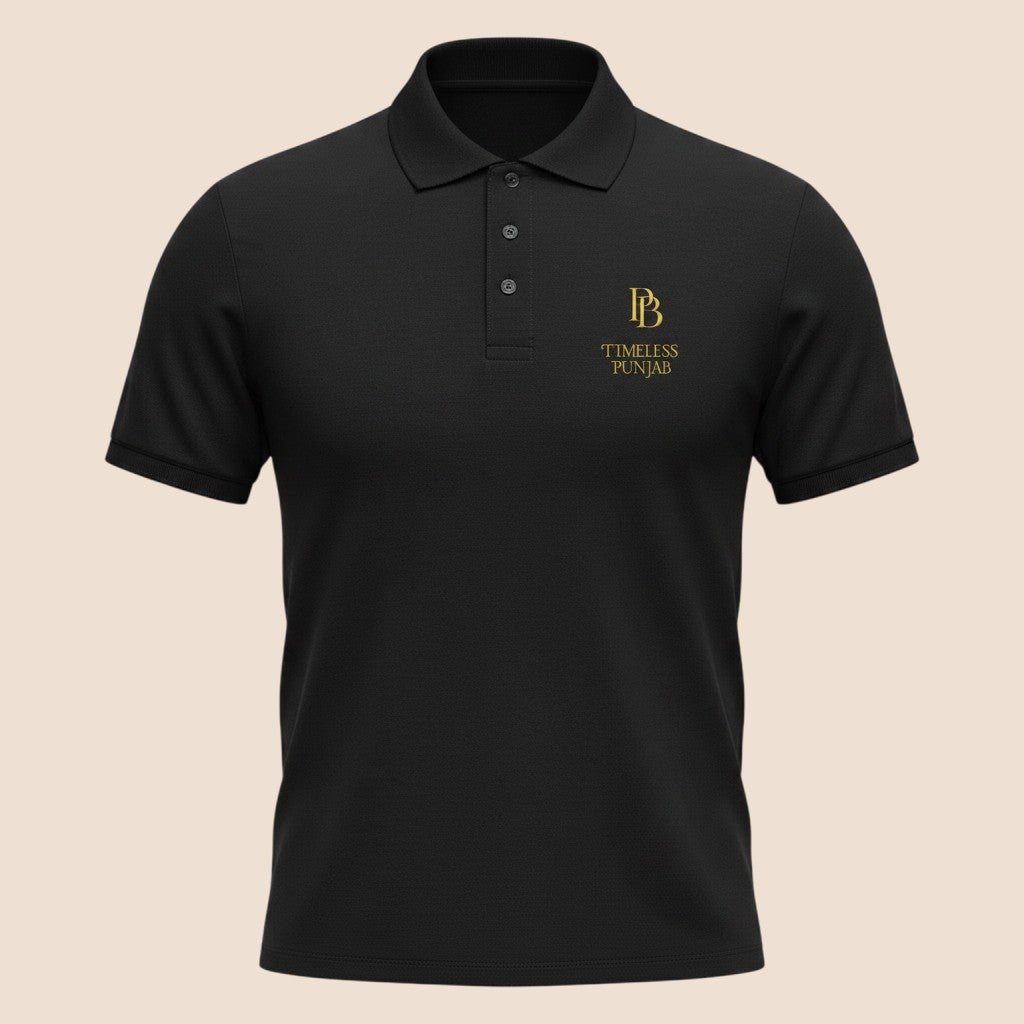 PUNJAB BOLDA black cotton polo shirt with ribbed collar, 3-button placket, and gold Timeless Punjab logo embroidery.
