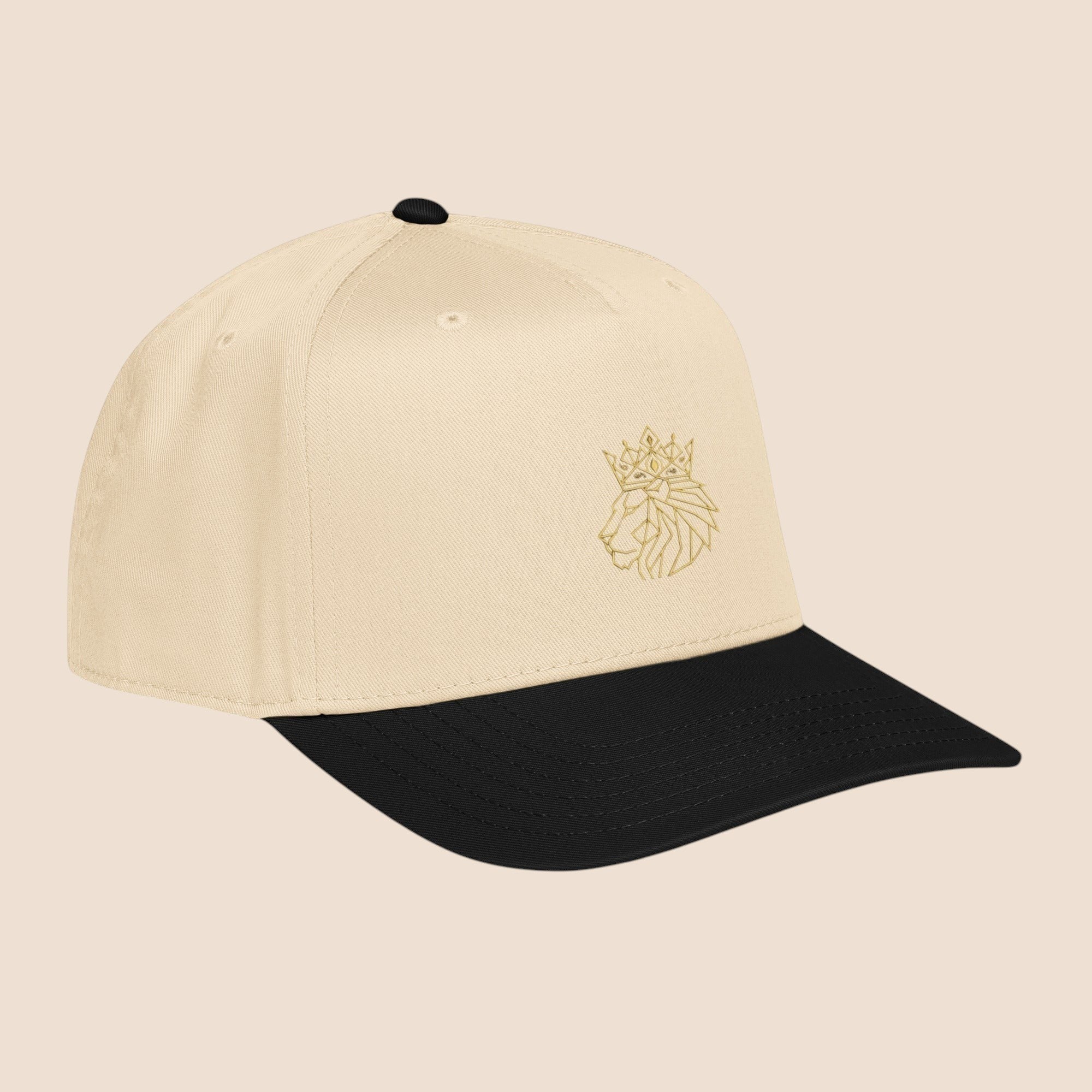 PUNJAB BOLDA cream and black 5 panel cap with embroidered gold lion and crown logo. Polyester-cotton blend.