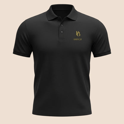 PUNJAB BOLDA ANAKH premium black pique cotton polo shirt with gold logo embroidery and 3-button placket.