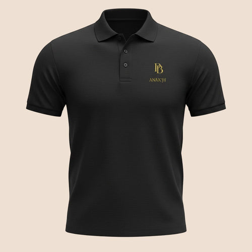 PUNJAB BOLDA ANAKH premium black pique cotton polo shirt with gold logo embroidery and 3-button placket.