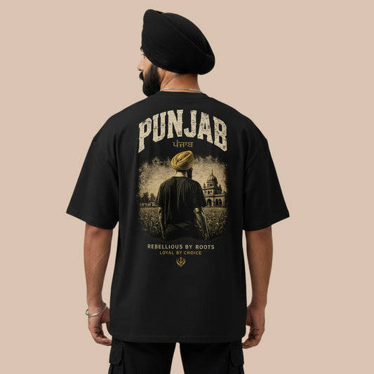 PUNJAB BOLDA black oversized t-shirt with graphic print of a man in a turban facing a building. 100% organic cotton.