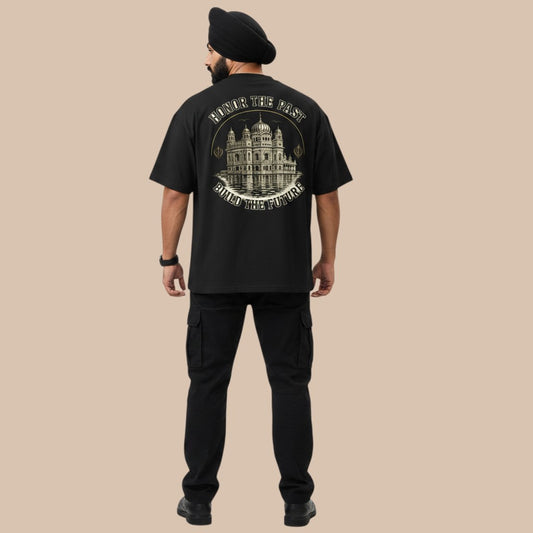 PUNJAB BOLDA black oversized t-shirt with dropped shoulders and wide collar, featuring a graphic print of a building and text.