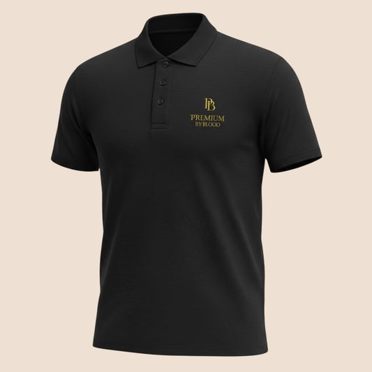 PUNJAB BOLDA black pique polo shirt with gold PREMIUM BY BLOOD logo, featuring a 3-button placket and ribbed collar.