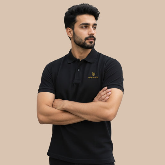 PUNJAB BOLDA black pique polo shirt with gold LION BLOOD logo, 100% cotton, classic fit, ribbed collar, and button placket.