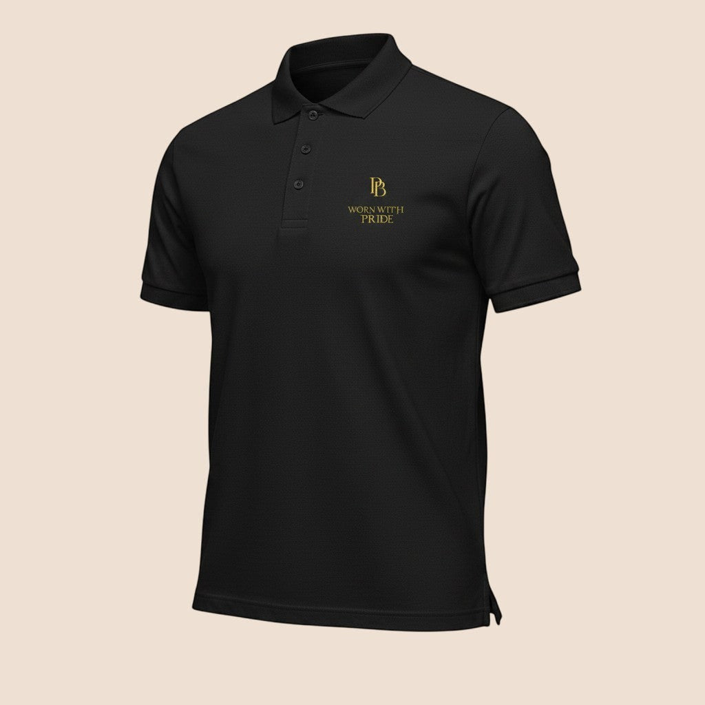 PUNJAB BOLDA black cotton polo shirt with WORN WITH PRIDE gold embroidery, ribbed collar, and 3-button placket.