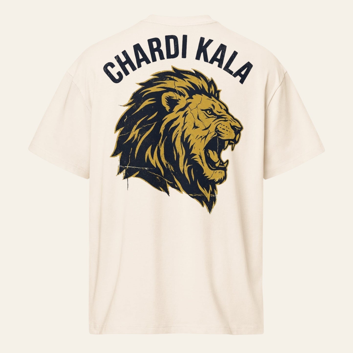 PUNJAB BOLDA cream oversized boxy tee featuring a distressed gold and black lion graphic with Chardi Kala text on back