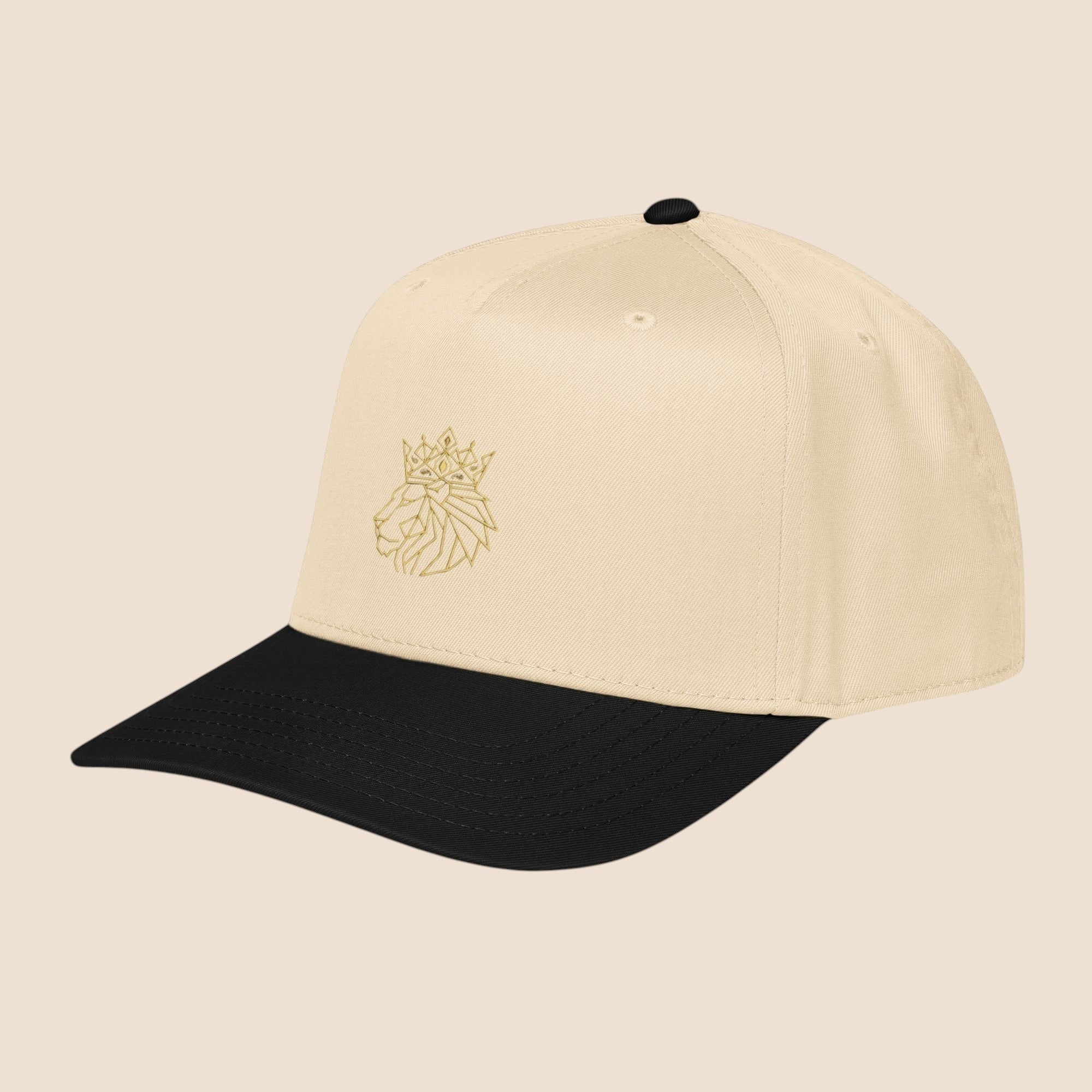 PUNJAB BOLDA crowned lion 5 panel cap in beige and black with embroidered gold lion graphic. Polyester-cotton blend.