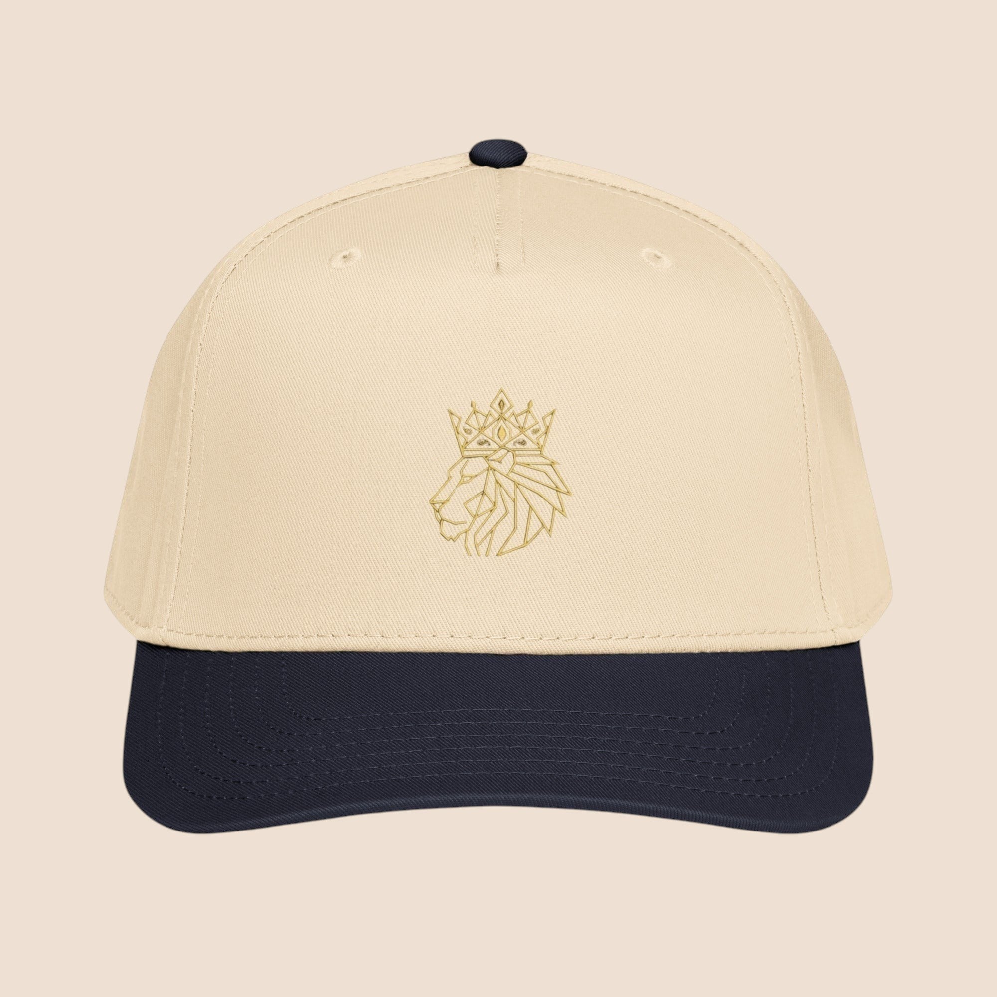 PUNJAB BOLDA beige and navy 5 panel cap with embroidered crowned lion logo on front panel.
