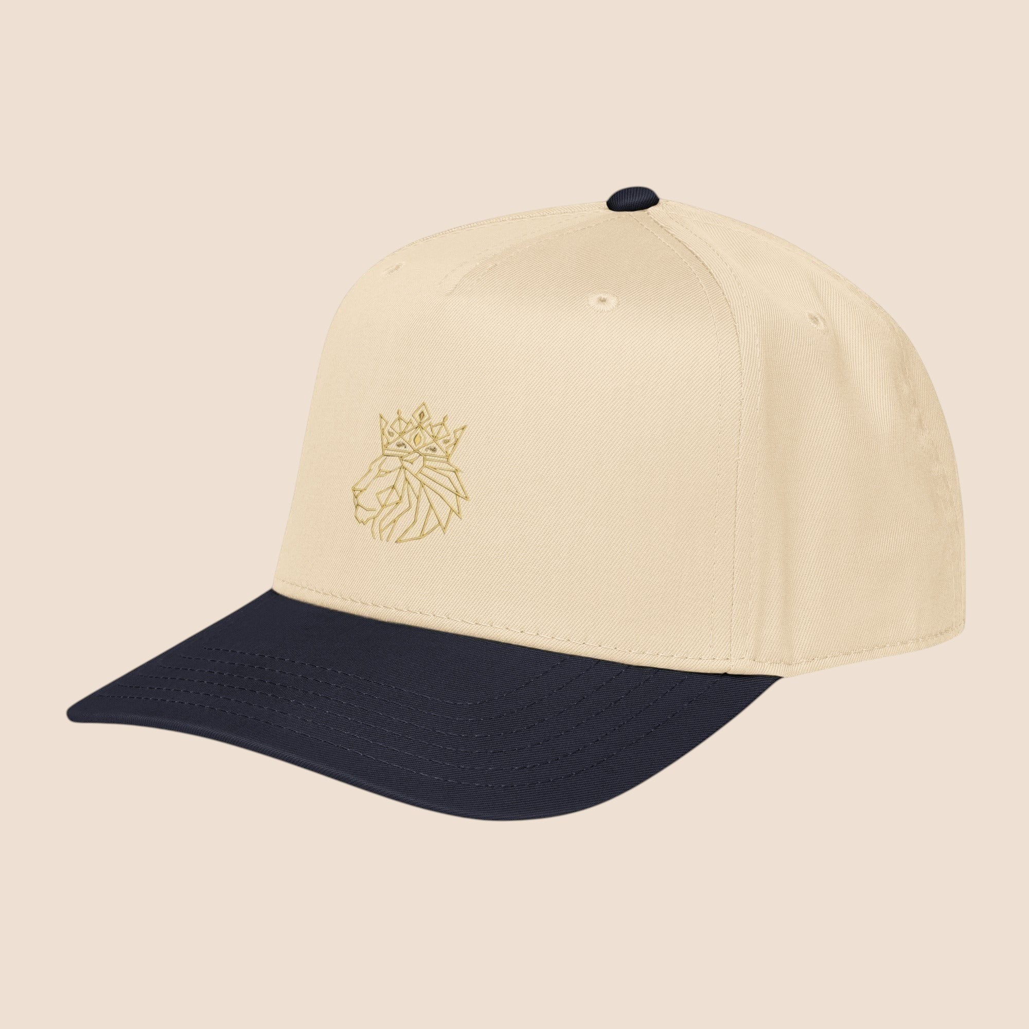 PUNJAB BOLDA crowned lion 5 panel cap in beige and navy blue with adjustable snap closure and curved visor.
