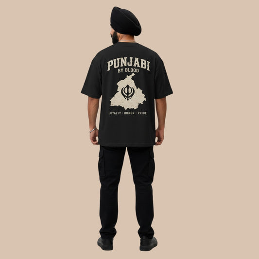 PUNJAB BOLDA black oversized t-shirt with "PUNJABI BY BLOOD" graphic and map of Punjab. 100% organic cotton.