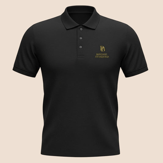 PUNJAB BOLDA black SARDARI STANDARD pique polo shirt with gold logo embroidery and a three-button placket.